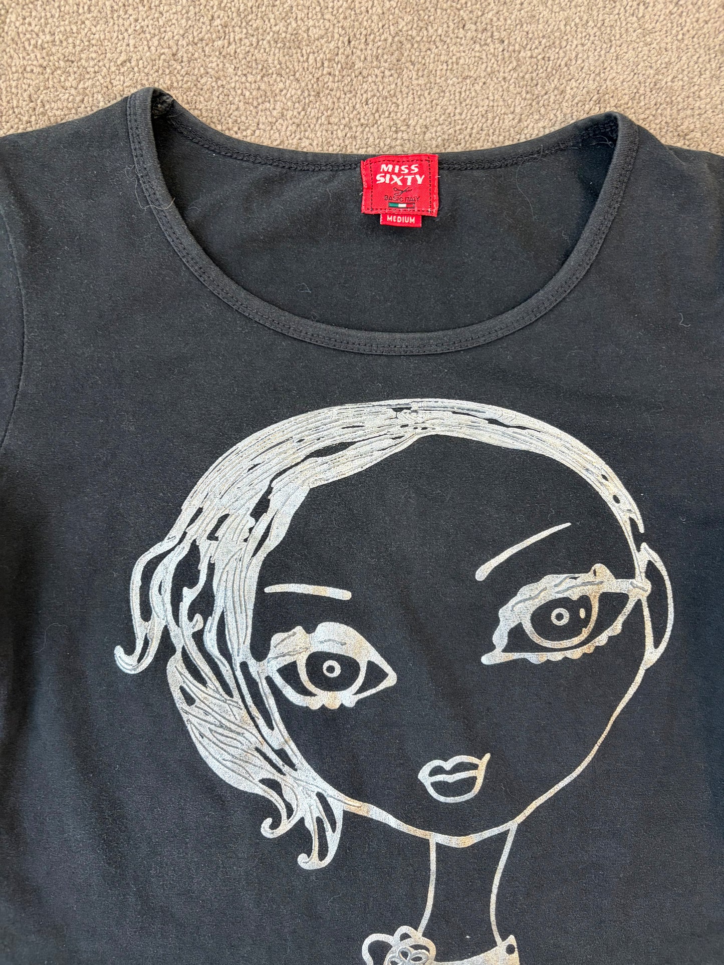 Miss Sixty Graphic Baby Tee in Black with Metallic Character Print